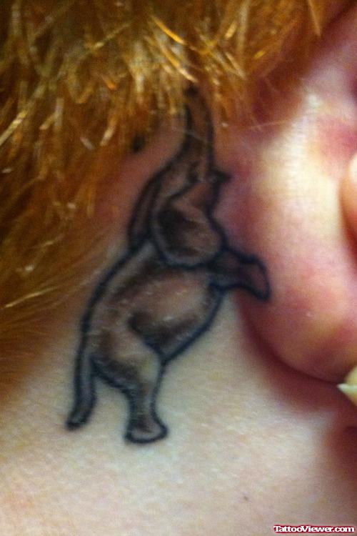 Grey Ink Elephant Ear Tattoo