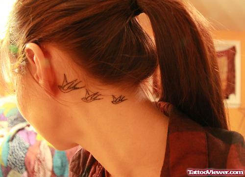 Girl With Flying Birds Back Ear Tattoo
