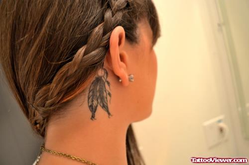 Feather Right Ear Tattoo