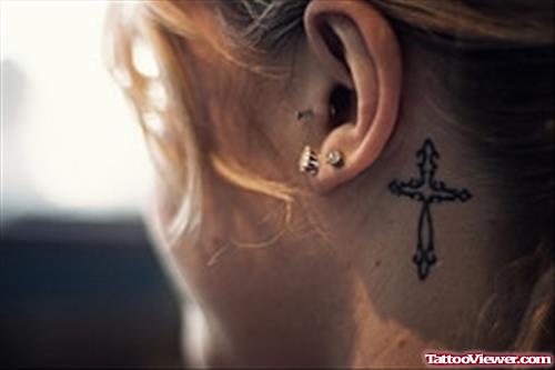 Below Ear Cross Tattoo