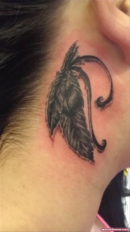 Awesome Grey Ink Feather Tattoo Behind Ear