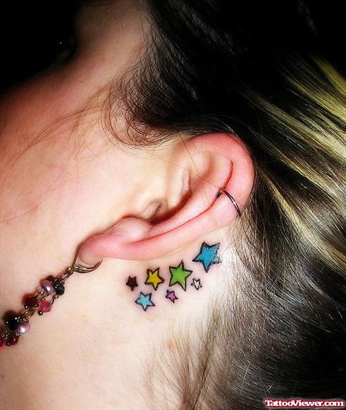 Colored Stars Back Ear Tattoo For Girls
