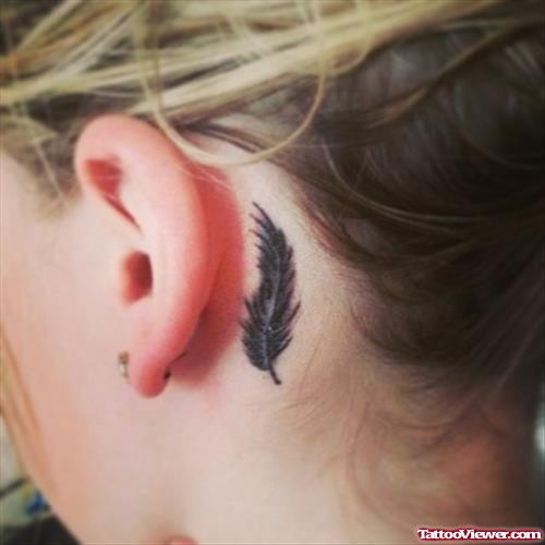 Feather Behind Ear Tattoo