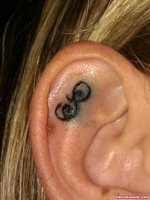 Awful Girl Right Ear Tattoo