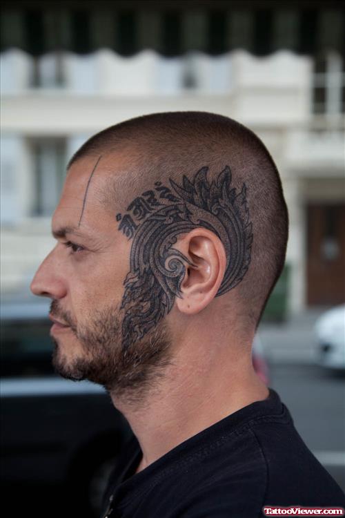 Grey Ink Tattoo Around Ear