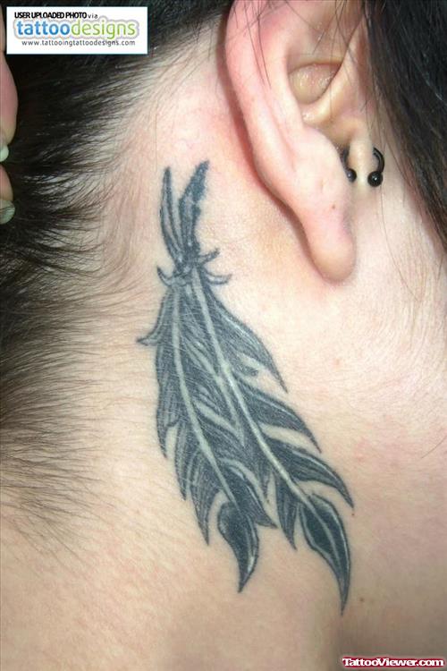Grey Ink Fear Tattoo Behind Ear
