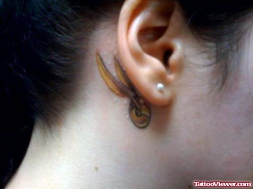 Golden Snitch Tattoo Behind Ear