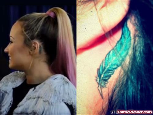 Demi Lovato Green Feather Ear Tattoo