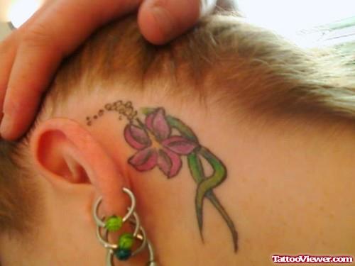 Color Flower Left Ear Tattoo