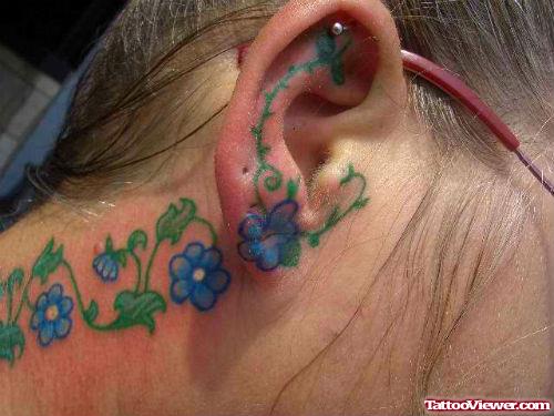 Blue Flowers Right Ear Tattoo