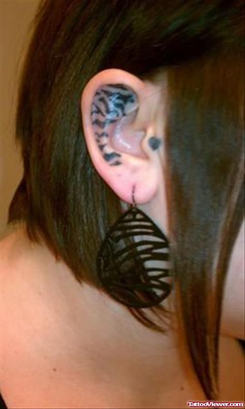 Black Ink Tiger Skin Ear Tattoo