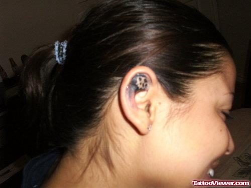 Girl Right Ear Skull Tattoo
