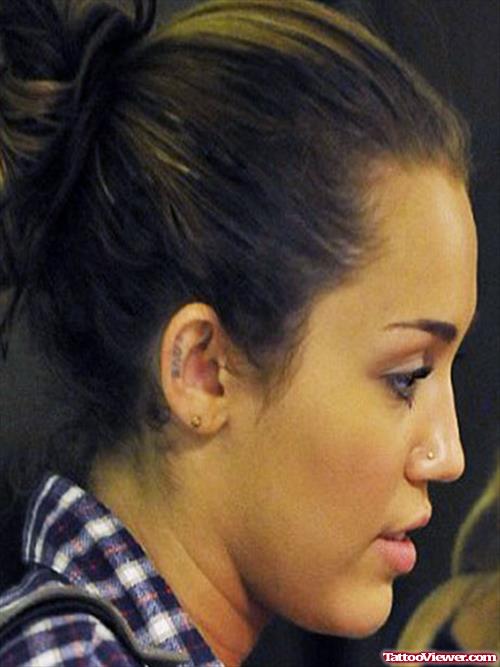 Cute Miley Cyrus Ear Tattoo