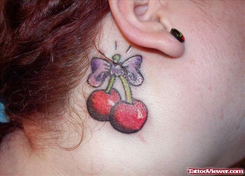 Bow And Cherry Ear Tattoo