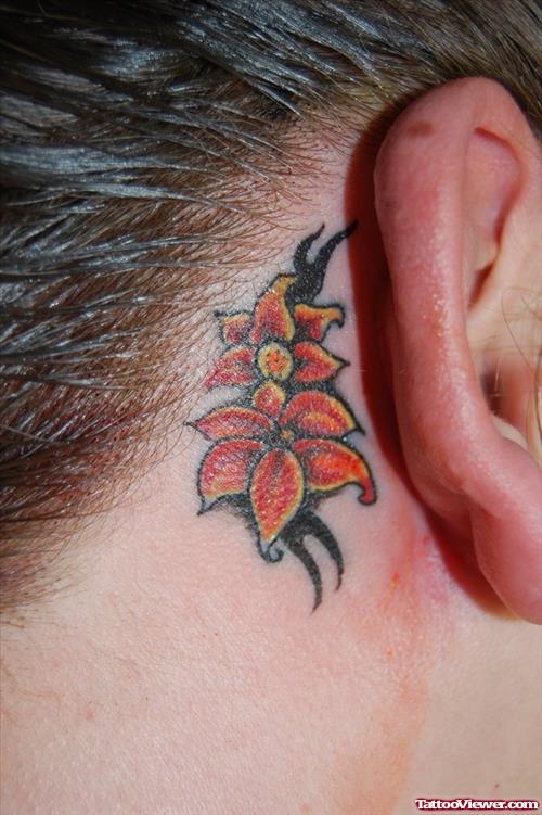 Black Tribal And Flowers Back Ear Tattoo