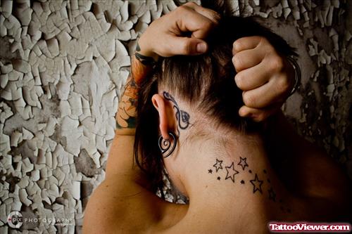 Black Ink Swirl Tattoo Behind The Ear