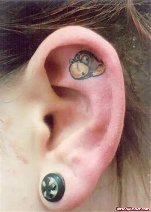 Monkey Head Tattoo Inside Ear