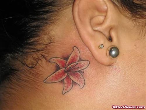 Cute Small Lily Tattoo Behind Ear