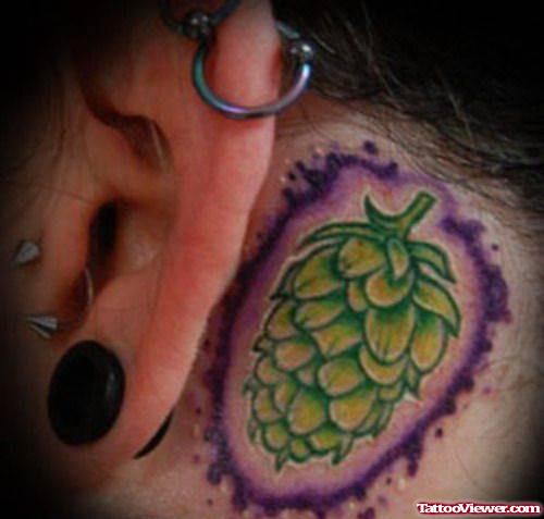Pine Apple Tattoo Behind Ear