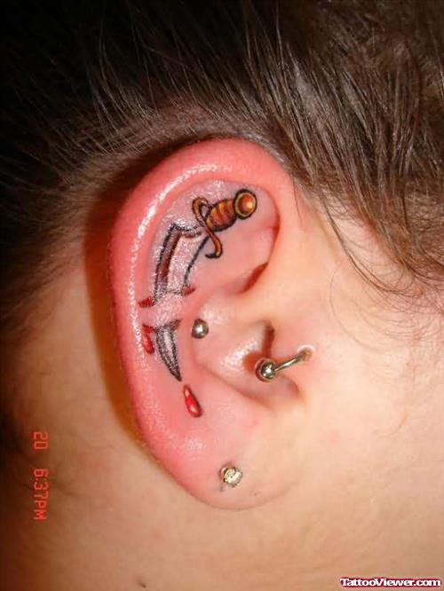 Sword Tattoo Inside Ear