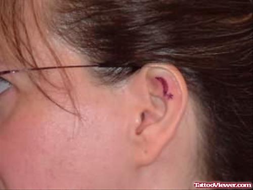 Tiny Star Tattoo Inside Ear