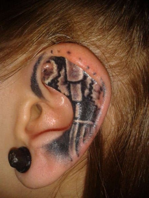 Black Ink Left Ear Tattoo
