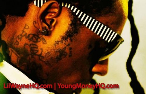 Lil Wayne Back Ear Tattoo