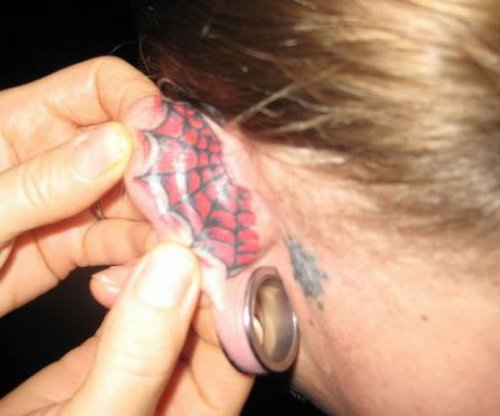 Red Spider Web Behind Ear Tattoo