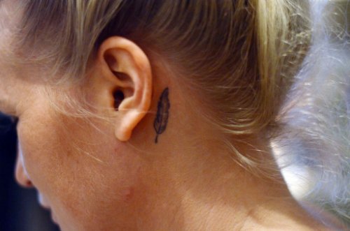 Feather Back Ear Tattoo
