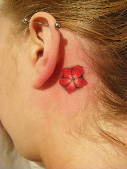 Red Flower Below Ear Tattoo
