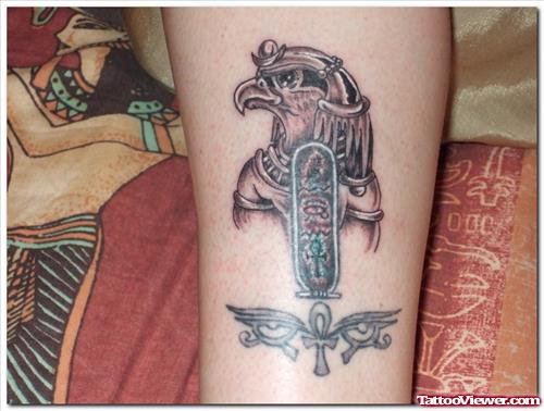 Grey Ink Egyptian Tattoo On Arm
