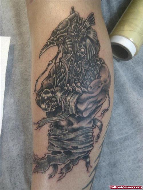 Grey Ink Egyptian God Tattoo On Sleeve