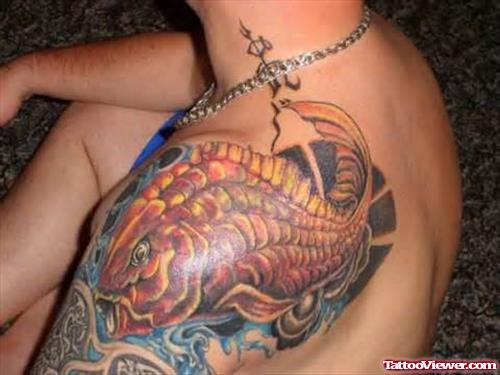 Egyptian Fish Tattoo On Upperback