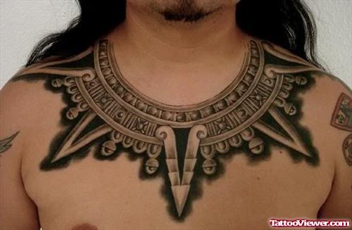 Grey Ink Egyptian Tattoo On Chest