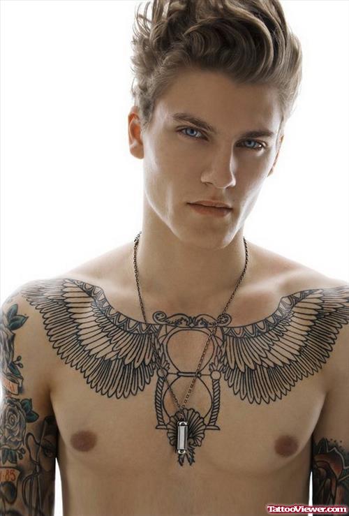 Winged Hourglass Egyptian Tattoo On Man Chest