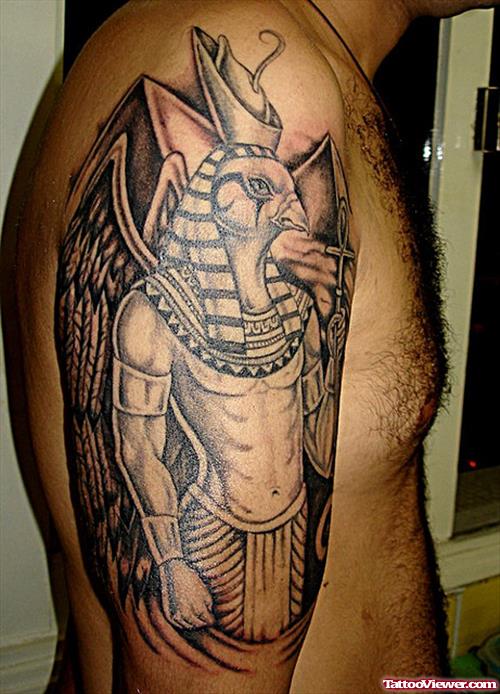 Grey Ink Egyptian Tattoo On Man Right Sleeve