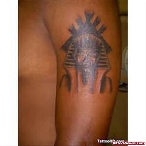 Grey Ink Egyptian Tattoo On Man Left Shoulder