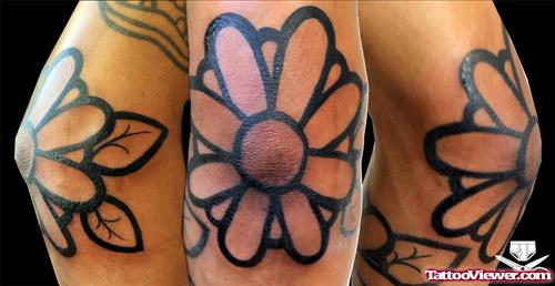 Outline Flower Elbow Tattoo