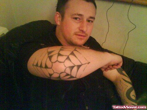Guy With Spider Tattoo On Elbow