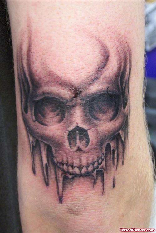 Grey Ink Skull Elbow Tattoo