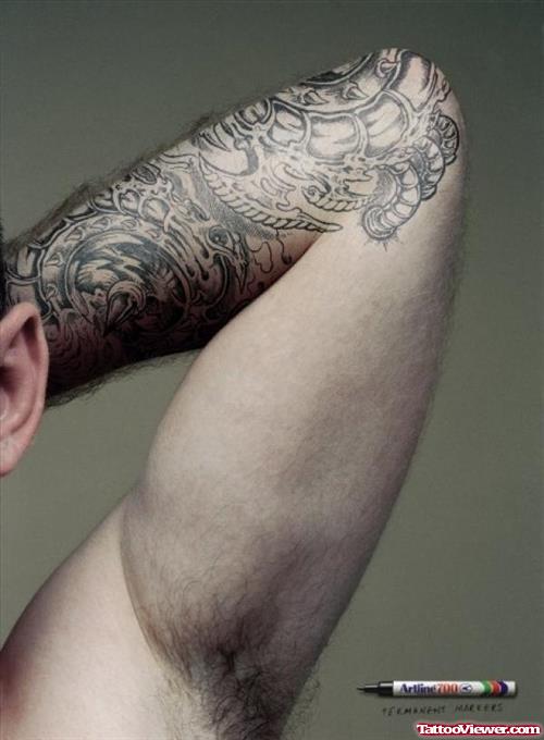 Grey Ink Left Elbow Tattoo For Men