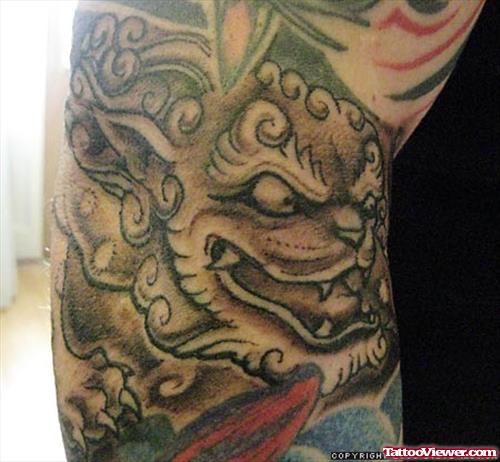 Grey Ink Foo Dog Elbow Tattoo