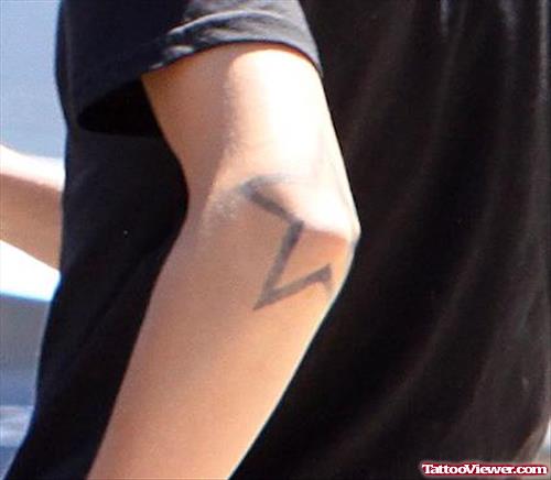 Star Tattoo On Left Elbow