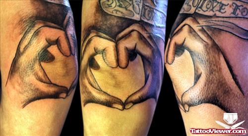 Hand Heart Elbow Tattoo