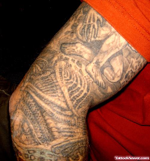 Grey Ink Biomechanical Elbow Tattoo
