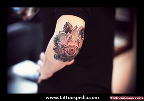 Amazing Grey Flower And Eye Elbow Tattoo