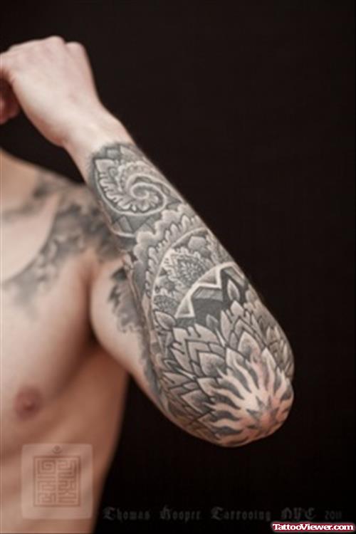 Grey Ink Mandala Flower Tattoo On Elbow