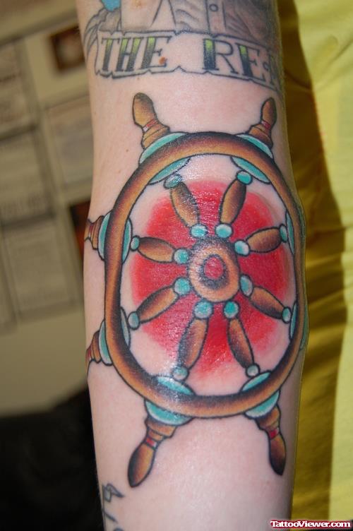 Colored Ship Stering Compass Elbow Tattoo