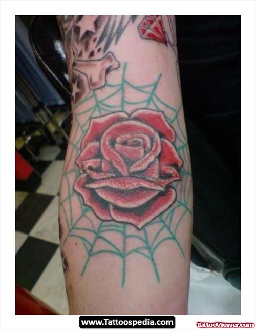 Spider Web And Red Rose Elbow Tattoo