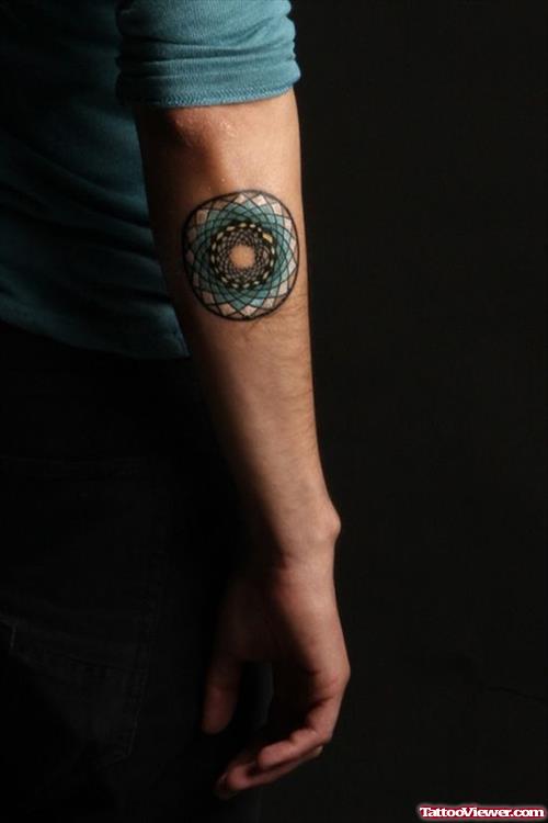 Awesome Circle Tattoo On Right Elbow
